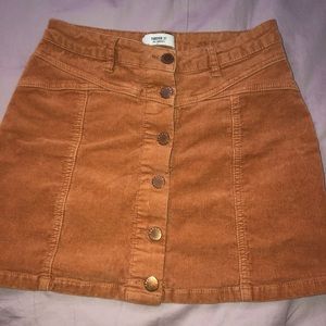 super cute brown/tan miniskirt with buttons